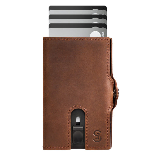 SLIMJACK Smart Wallet in Dunkelbraun – RFID-geschütztes Kreditkartenetui mit Aluminium-Kartenhalter und integriertem Münzfach. Kompakt, sicher und edel im Design. Für Männer, die Stil und Funktion in der Hosentasche tragen wollen.